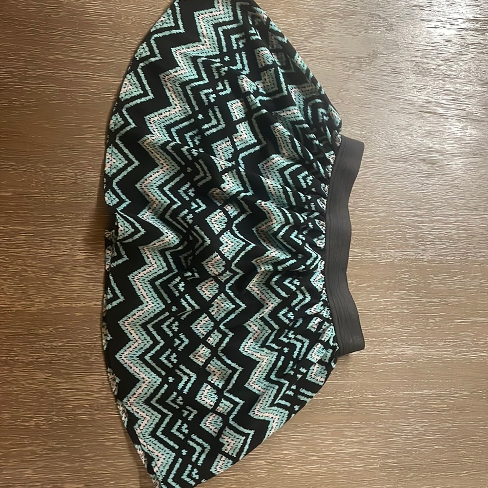 Two skirts with attached shorts.